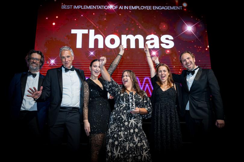 Team Thomas celebrates winning the Best Implementation for AI in Employee Engagement award at the Engage awards for Thom AI